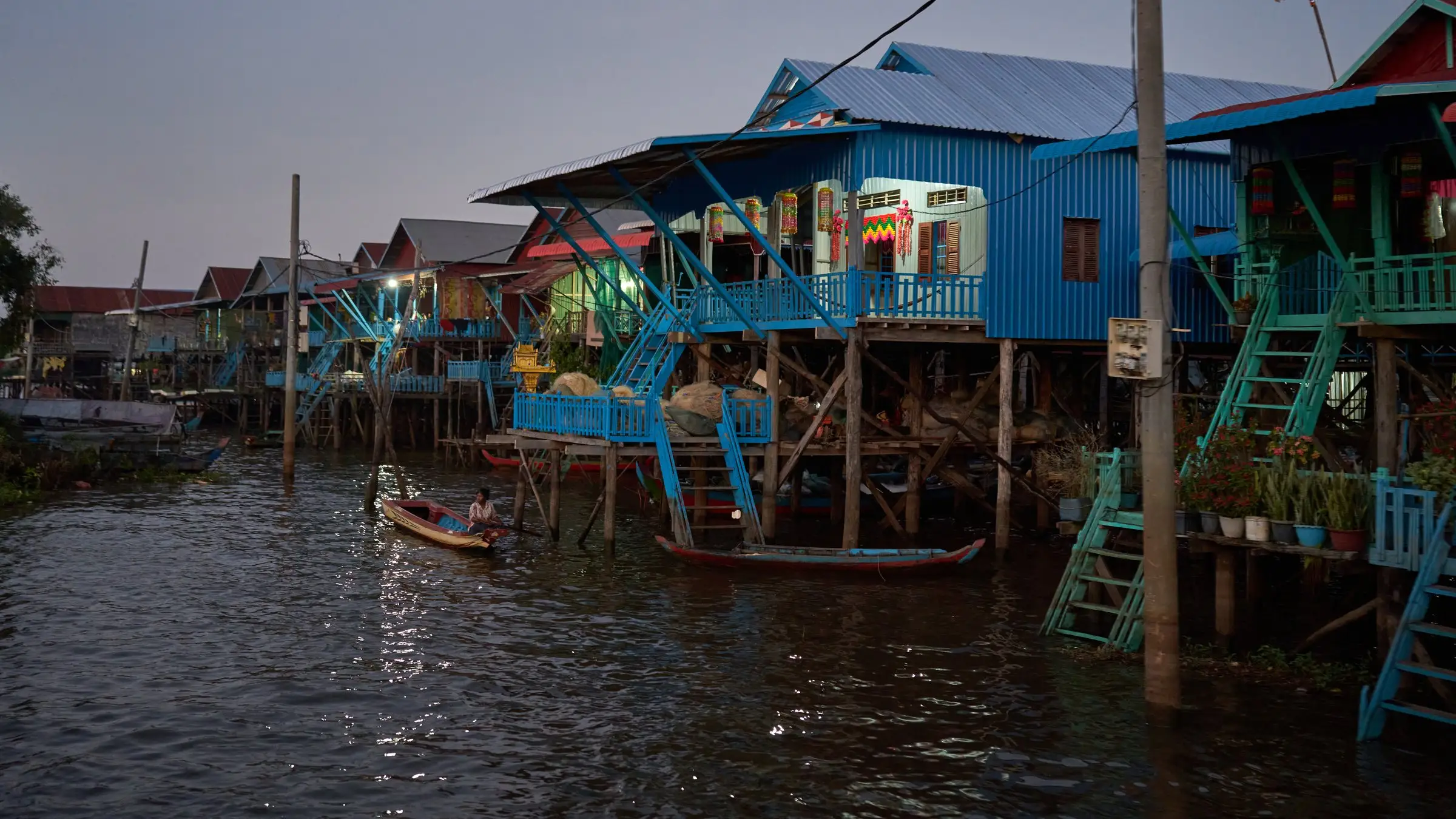 Evening light over the stilted homes of Kampong Khleang