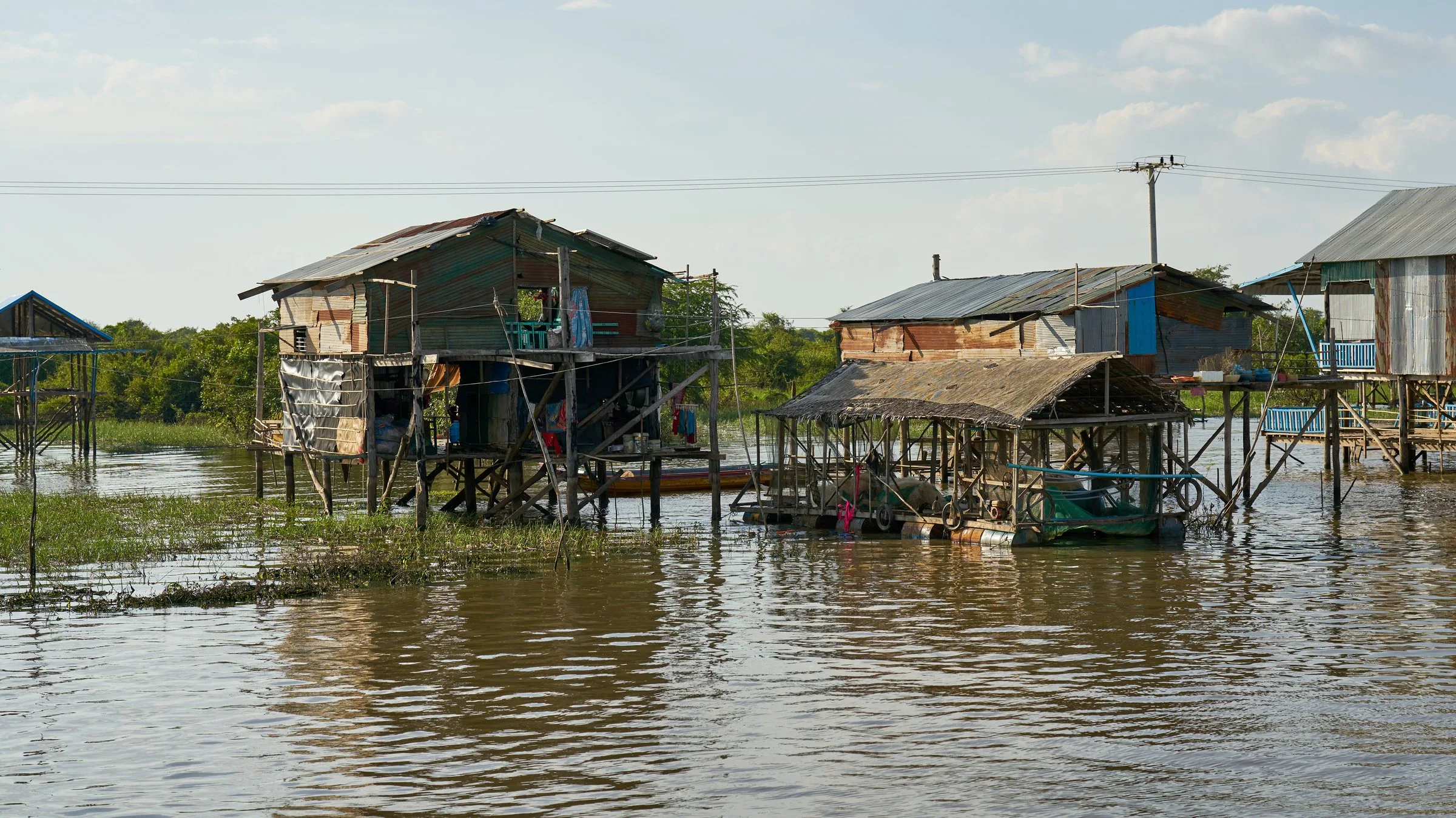 Stilted homes on the water at Kampong Khleang